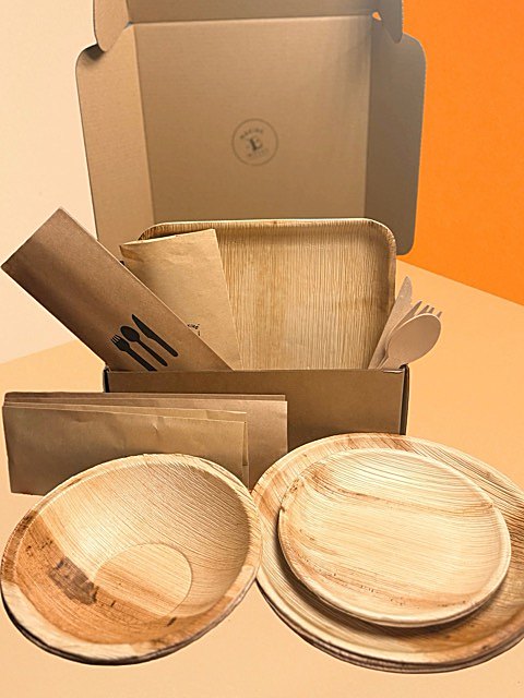 The kit's sturdy palm-leaf plates and bowls